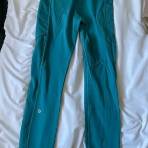 Turquoise/teal Lululemon running leggings 28 inch